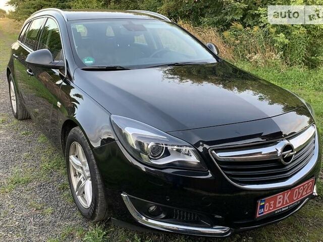 Чорний Опель Insignia Sports Tourer, об'ємом двигуна 2 л та пробігом 184 тис. км за 13350 $, фото 1 на Automoto.ua