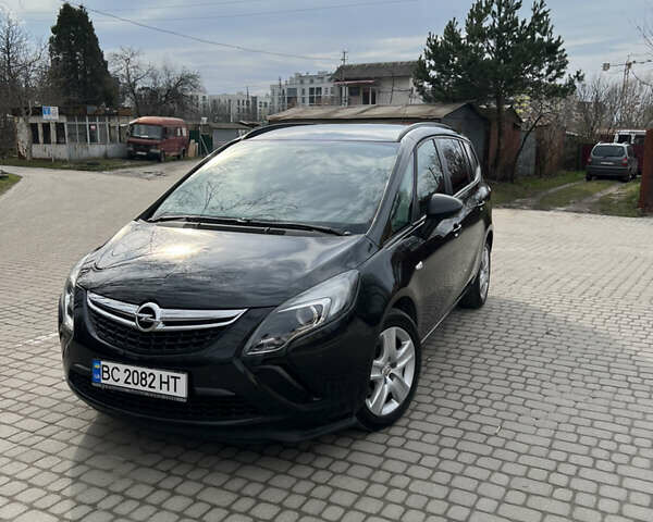 Черный Опель Zafira Tourer, объемом двигателя 0 л и пробегом 173 тыс. км за 9600 $, фото 1 на Automoto.ua