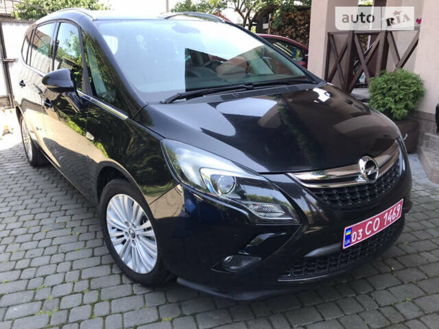 Черный Опель Zafira Tourer, объемом двигателя 1.6 л и пробегом 216 тыс. км за 11400 $, фото 1 на Automoto.ua