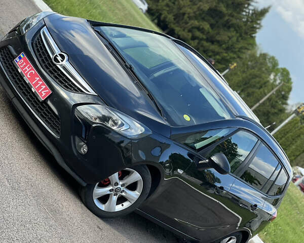 Черный Опель Zafira Tourer, объемом двигателя 2 л и пробегом 227 тыс. км за 8900 $, фото 1 на Automoto.ua