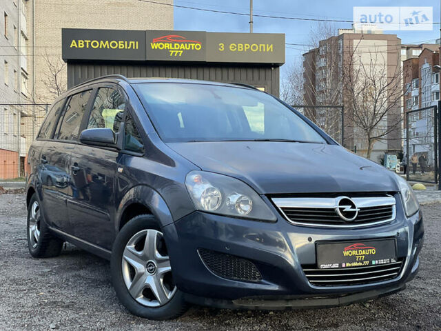 Серый Опель Zafira Tourer, объемом двигателя 1.7 л и пробегом 220 тыс. км за 6555 $, фото 1 на Automoto.ua