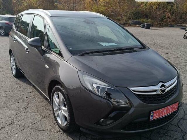 Серый Опель Zafira Tourer, объемом двигателя 1.4 л и пробегом 195 тыс. км за 10599 $, фото 1 на Automoto.ua