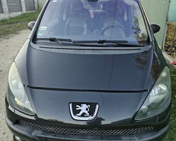 Черный Пежо 1007, объемом двигателя 1.59 л и пробегом 162 тыс. км за 5000 $, фото 1 на Automoto.ua