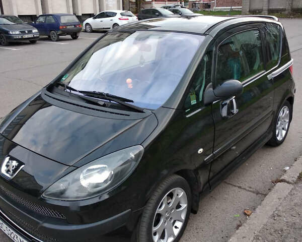 Черный Пежо 1007, объемом двигателя 1.6 л и пробегом 189 тыс. км за 4800 $, фото 1 на Automoto.ua