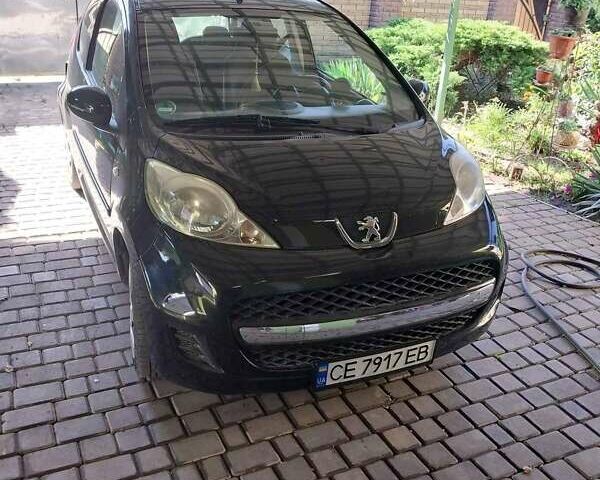 Черный Пежо 107, объемом двигателя 1 л и пробегом 58 тыс. км за 5600 $, фото 1 на Automoto.ua