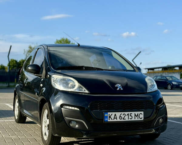 Черный Пежо 107, объемом двигателя 1 л и пробегом 119 тыс. км за 4800 $, фото 1 на Automoto.ua