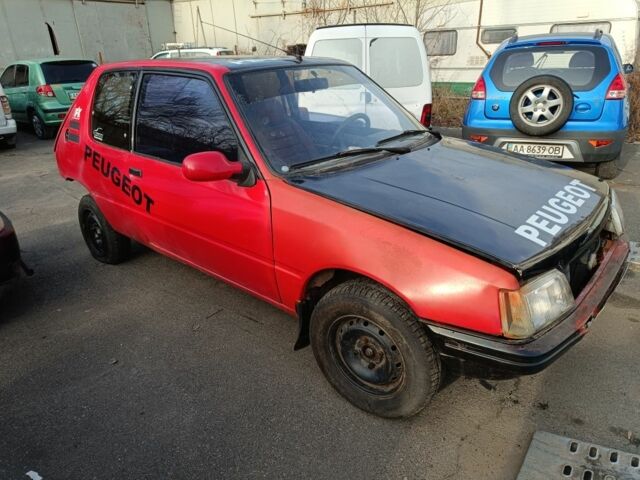 Красный Пежо 205, объемом двигателя 1.4 л и пробегом 100 тыс. км за 350 $, фото 1 на Automoto.ua