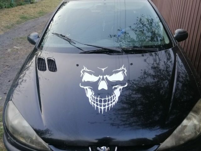 Черный Пежо 206, объемом двигателя 2 л и пробегом 300 тыс. км за 800 $, фото 1 на Automoto.ua