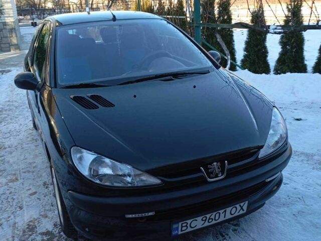 Черный Пежо 206, объемом двигателя 1.4 л и пробегом 211 тыс. км за 3300 $, фото 1 на Automoto.ua