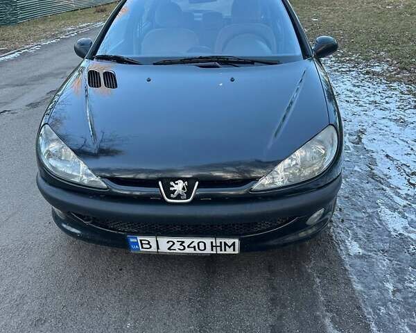 Черный Пежо 206, объемом двигателя 2 л и пробегом 383 тыс. км за 2800 $, фото 1 на Automoto.ua