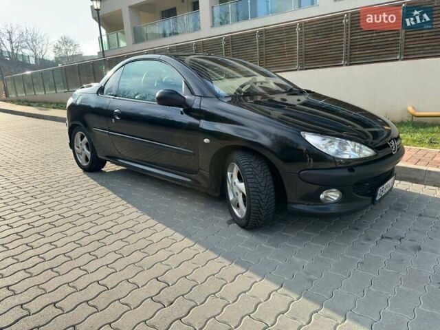Черный Пежо 206, объемом двигателя 1.59 л и пробегом 231 тыс. км за 3600 $, фото 1 на Automoto.ua