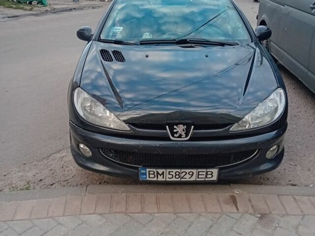 Черный Пежо 206, объемом двигателя 1.6 л и пробегом 250 тыс. км за 2800 $, фото 1 на Automoto.ua