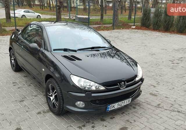 Черный Пежо 206, объемом двигателя 1.59 л и пробегом 216 тыс. км за 3800 $, фото 1 на Automoto.ua