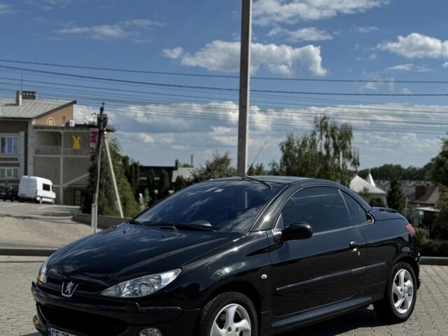 Черный Пежо 206, объемом двигателя 1.6 л и пробегом 175 тыс. км за 4700 $, фото 1 на Automoto.ua