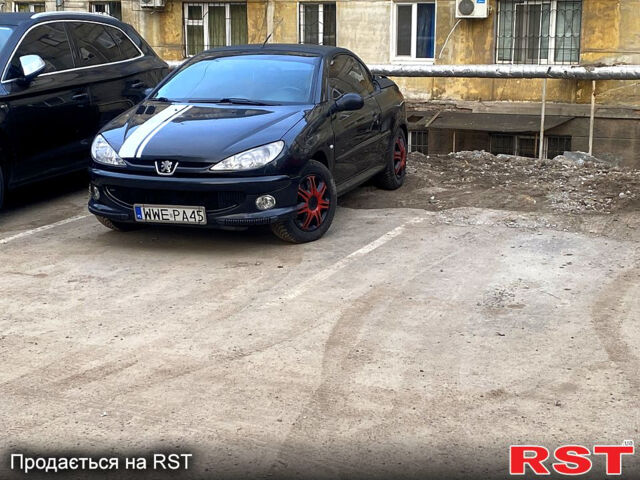 Черный Пежо 206, объемом двигателя 1.6 л и пробегом 236 тыс. км за 2200 $, фото 1 на Automoto.ua