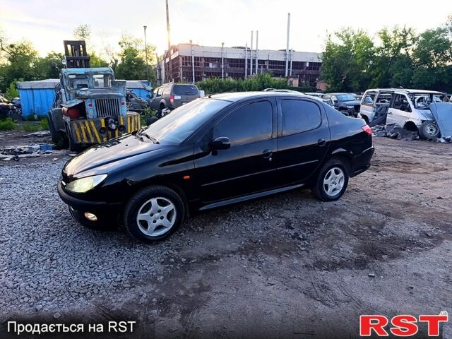 Черный Пежо 206, объемом двигателя 1.4 л и пробегом 220 тыс. км за 2499 $, фото 1 на Automoto.ua