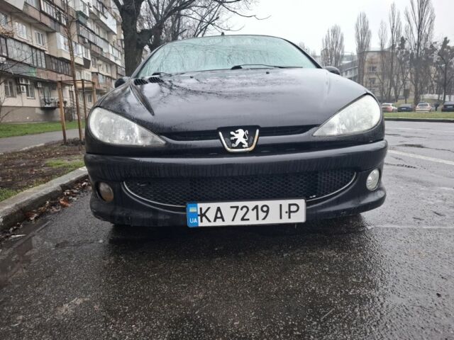 Черный Пежо 206, объемом двигателя 1.4 л и пробегом 151 тыс. км за 3900 $, фото 1 на Automoto.ua