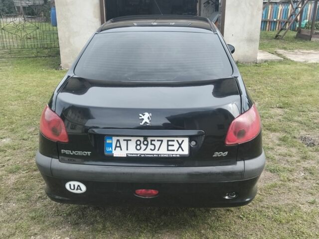 Черный Пежо 206, объемом двигателя 1.4 л и пробегом 147 тыс. км за 3200 $, фото 1 на Automoto.ua