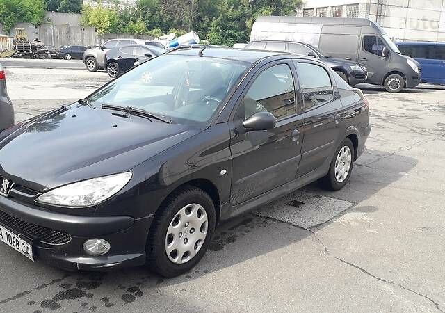 Чорний Пежо 206, об'ємом двигуна 1.4 л та пробігом 209 тис. км за 3800 $, фото 1 на Automoto.ua