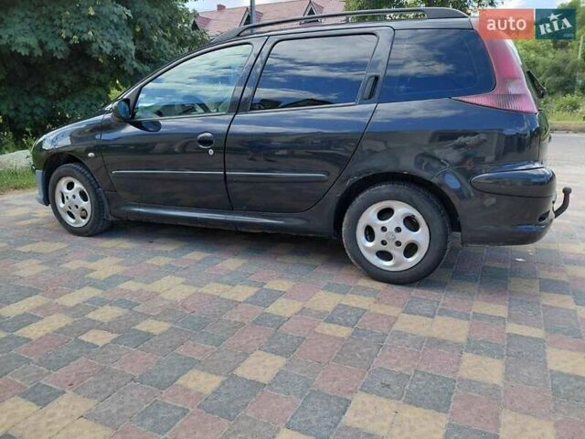 Черный Пежо 206, объемом двигателя 1.4 л и пробегом 348 тыс. км за 3400 $, фото 1 на Automoto.ua