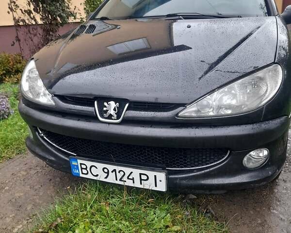 Черный Пежо 206, объемом двигателя 1.4 л и пробегом 286 тыс. км за 3160 $, фото 1 на Automoto.ua