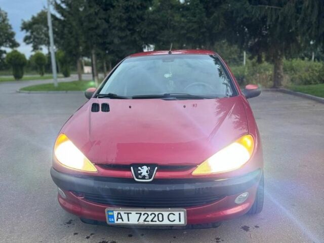 Красный Пежо 206, объемом двигателя 1.4 л и пробегом 236 тыс. км за 1900 $, фото 1 на Automoto.ua