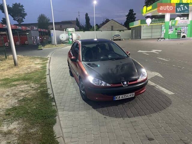 Красный Пежо 206, объемом двигателя 1.4 л и пробегом 221 тыс. км за 3300 $, фото 1 на Automoto.ua