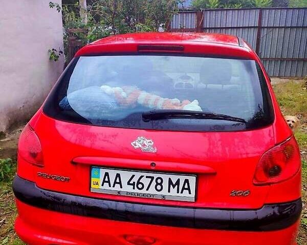 Красный Пежо 206, объемом двигателя 1.4 л и пробегом 211 тыс. км за 3000 $, фото 1 на Automoto.ua