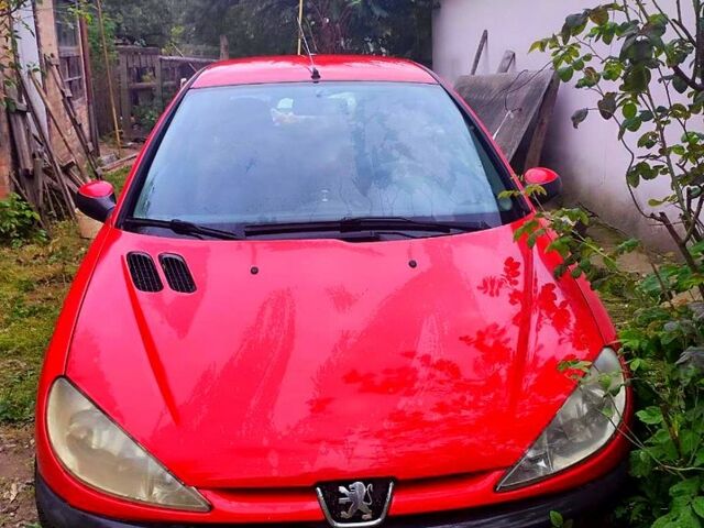 Червоний Пежо 206, об'ємом двигуна 1.4 л та пробігом 211 тис. км за 3000 $, фото 1 на Automoto.ua