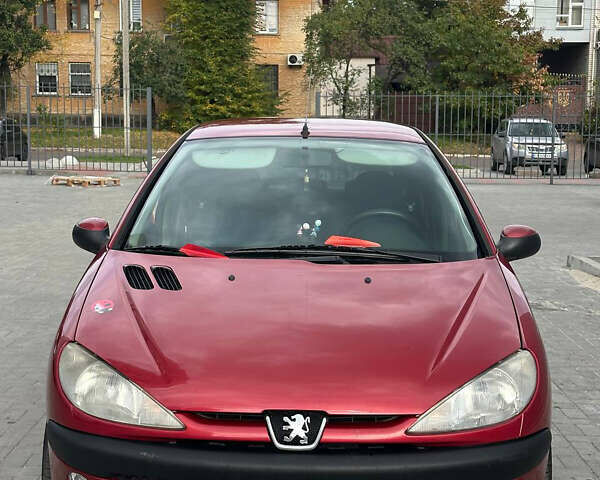 Червоний Пежо 206, об'ємом двигуна 1.59 л та пробігом 195 тис. км за 3800 $, фото 1 на Automoto.ua