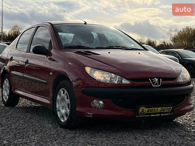 Красный Пежо 206, объемом двигателя 1.4 л и пробегом 139 тыс. км за 3999 $, фото 1 на Automoto.ua