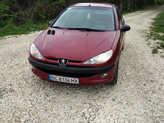 Червоний Пежо 206, об'ємом двигуна 1.4 л та пробігом 260 тис. км за 2650 $, фото 1 на Automoto.ua