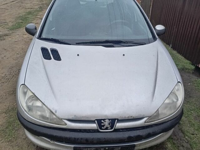 Серый Пежо 206, объемом двигателя 1.9 л и пробегом 200 тыс. км за 1100 $, фото 1 на Automoto.ua