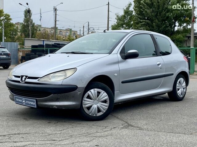 Серый Пежо 206, объемом двигателя 1.1 л и пробегом 187 тыс. км за 2300 $, фото 1 на Automoto.ua