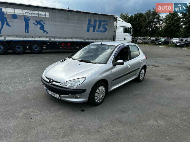 Серый Пежо 206, объемом двигателя 1.4 л и пробегом 247 тыс. км за 3500 $, фото 1 на Automoto.ua