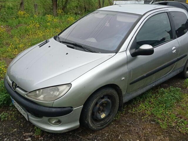 Серый Пежо 206, объемом двигателя 1.6 л и пробегом 276 тыс. км за 1375 $, фото 1 на Automoto.ua