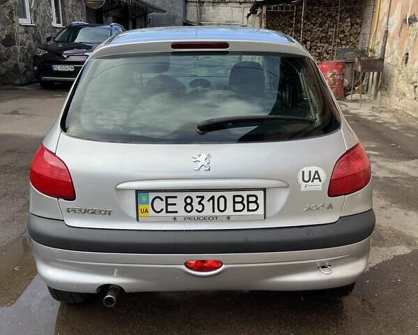 Серый Пежо 206, объемом двигателя 1.6 л и пробегом 97 тыс. км за 4500 $, фото 1 на Automoto.ua