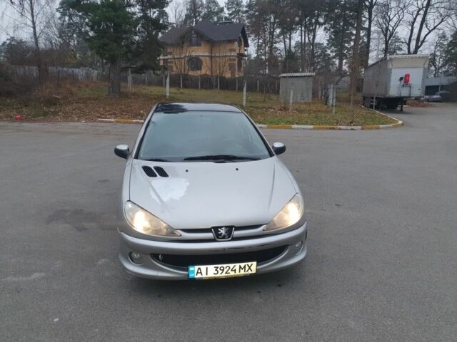Серый Пежо 206, объемом двигателя 1.4 л и пробегом 260 тыс. км за 3000 $, фото 1 на Automoto.ua