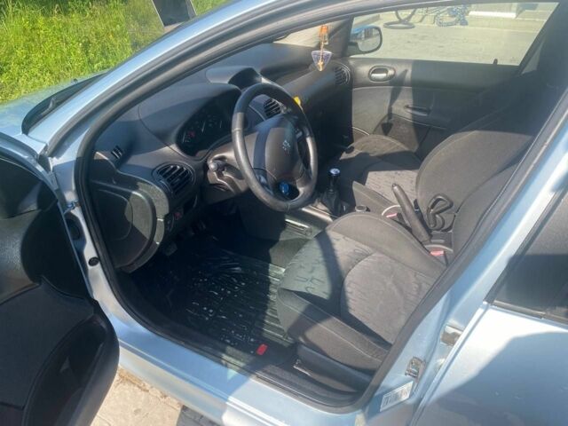 Серый Пежо 206, объемом двигателя 1.4 л и пробегом 234 тыс. км за 2900 $, фото 1 на Automoto.ua