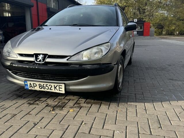Серый Пежо 206, объемом двигателя 1.4 л и пробегом 202 тыс. км за 2499 $, фото 1 на Automoto.ua