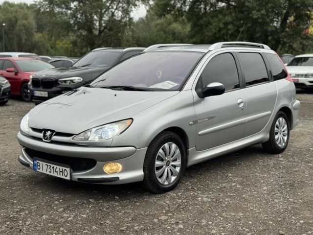 Серый Пежо 206, объемом двигателя 1.6 л и пробегом 240 тыс. км за 3693 $, фото 1 на Automoto.ua
