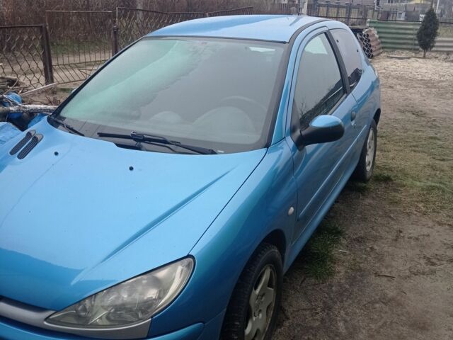 Синий Пежо 206, объемом двигателя 1.6 л и пробегом 350 тыс. км за 1650 $, фото 1 на Automoto.ua