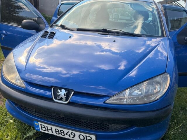 Синий Пежо 206, объемом двигателя 1.4 л и пробегом 300 тыс. км за 1500 $, фото 1 на Automoto.ua