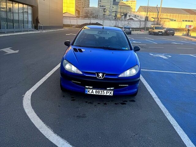 Синий Пежо 206, объемом двигателя 1.1 л и пробегом 310 тыс. км за 2100 $, фото 1 на Automoto.ua