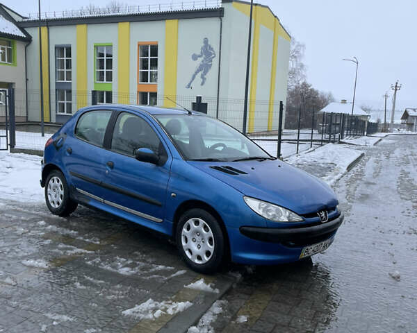 Синий Пежо 206, объемом двигателя 1.4 л и пробегом 242 тыс. км за 1999 $, фото 1 на Automoto.ua