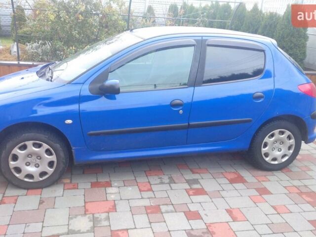 Синий Пежо 206, объемом двигателя 1.4 л и пробегом 150 тыс. км за 4050 $, фото 1 на Automoto.ua
