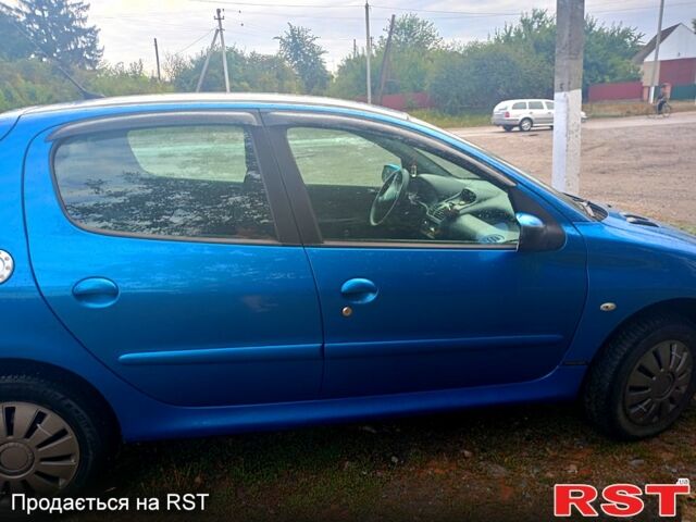 Синий Пежо 206, объемом двигателя 1.4 л и пробегом 211 тыс. км за 2800 $, фото 1 на Automoto.ua