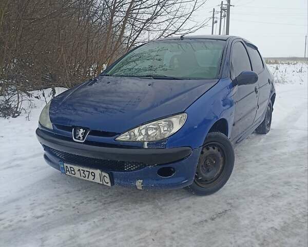 Синий Пежо 206, объемом двигателя 1.4 л и пробегом 333 тыс. км за 1999 $, фото 1 на Automoto.ua