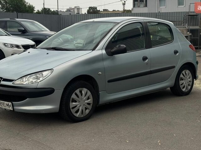 Синій Пежо 206, об'ємом двигуна 1.4 л та пробігом 240 тис. км за 2250 $, фото 1 на Automoto.ua