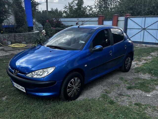 Синий Пежо 206, объемом двигателя 1.4 л и пробегом 151 тыс. км за 6400 $, фото 1 на Automoto.ua
